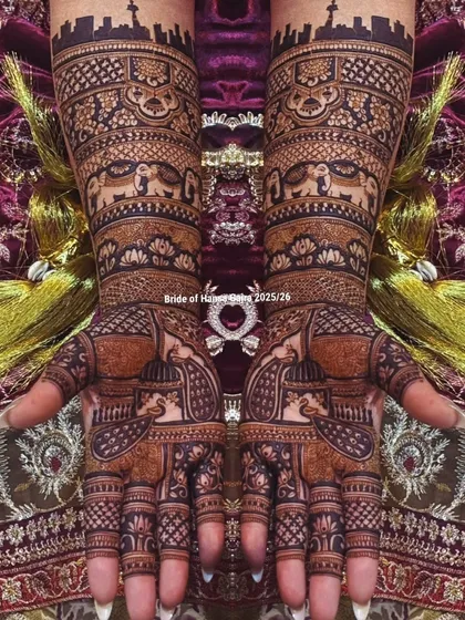 A truly royal design where tradition meets storytelling. This full-coverage mehendi features majestic elephants, a city skyline, and intricate jaali patterns for a grand bridal look.