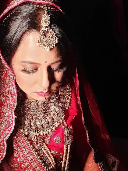 The lighting in this shot highlights the flawless HD finish of the makeup. The foundation is perfectly matched and blended, creating a smooth canvas that looks incredible both in person and on camera.