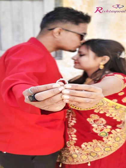 A couple holds up their engagement rings, a promise of the future they will build together. Start your journey to engagement and marriage with us.