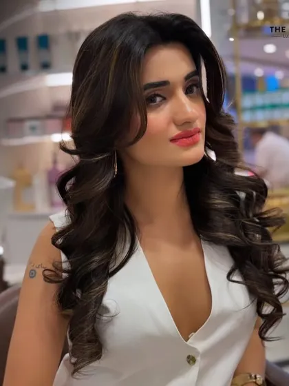Another angle of our renewed glam look, highlighting the flawless makeup and how the hairstyle frames the face. This is the kind of confidence-boosting look we love to create.
