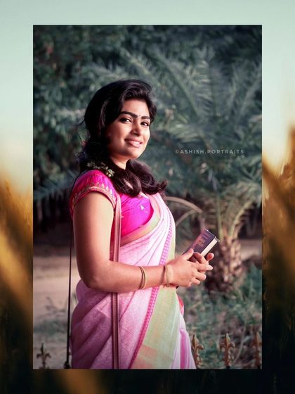 The beginning of a beautiful outdoor saree shoot. The makeup is kept fresh and rosy to complement the pink saree and the soft, natural lighting.