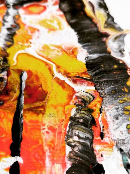 This macro shot shows the rich textures and colors of the autumn leaves. You can see how the paint has cracked and created patterns, just like real leaves.