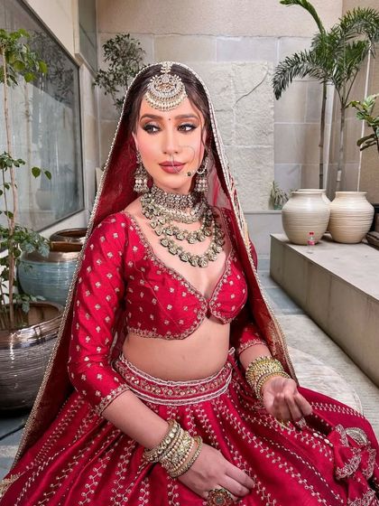 A beautiful shot of the bride with her veil, creating a sense of mystery and tradition.