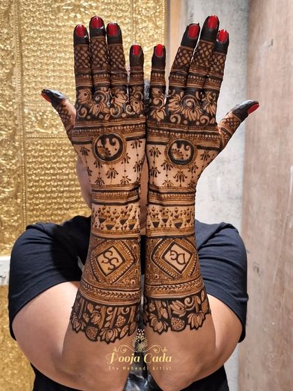 A bold siders design that extends up the arm. This piece features personalized initials in diamond frames, elephant mandalas, and lotus cuffs for a full and impressive look.