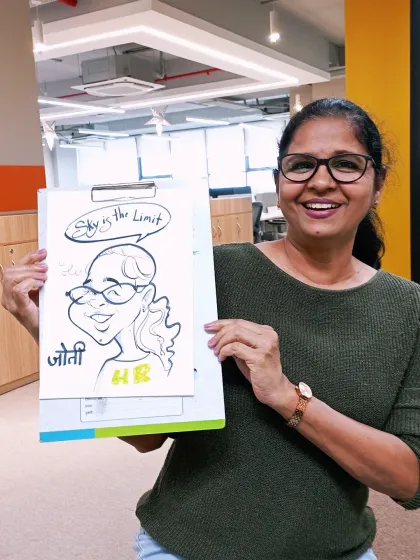 The HR team is all about people, and I loved capturing this HR professional's vibrant personality at a corporate event. The "Sky is the Limit" quote adds a motivational touch.