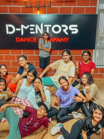 The hip-hop girls' crew posing after a session. This picture captures their attitude and team spirit.
