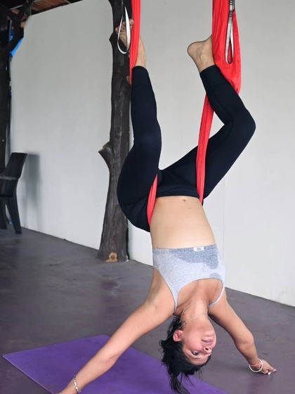 A beautiful inverted pose, allowing the spine to lengthen and the mind to relax. The support of the hammock makes deep stretches like this accessible and enjoyable.
