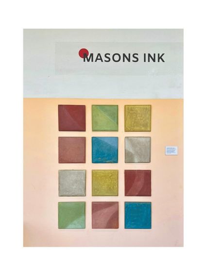 A colorful arrangement of Tadelakt tiles at our biennale showcase. This display demonstrated the vibrant aesthetic appeal of this traditional lime plaster technique.