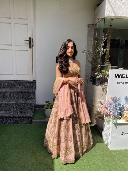 A full length view showing how the voluminous open hairstyle balances the entire look. This is from one of my masterclasses, where I teach other artists how to create these styles.