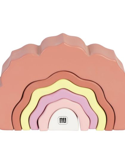 A wooden arch stacker toy in a rose color palette, assembled in a rainbow shape.