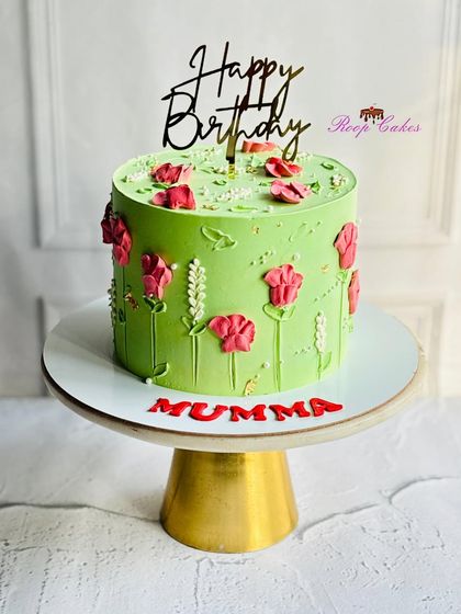 Green dreams and floral vibes for Mumma's birthday. This cake features beautiful palette knife painted flowers on a lovely green canvas.