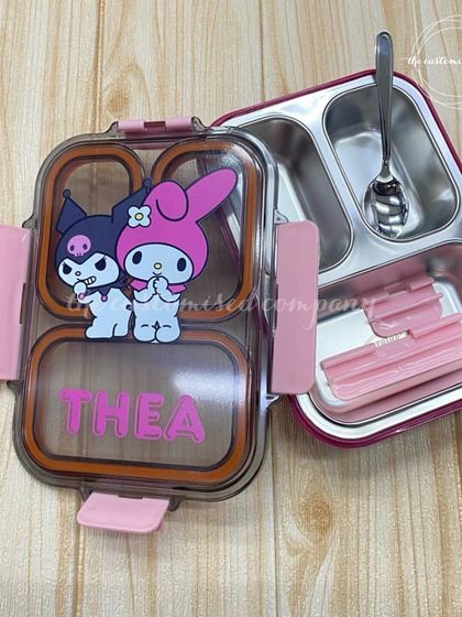 This personalized lunch box features the popular characters Kuromi and My Melody, along with the child's name. We can customize these lunch boxes with any character of your choice.