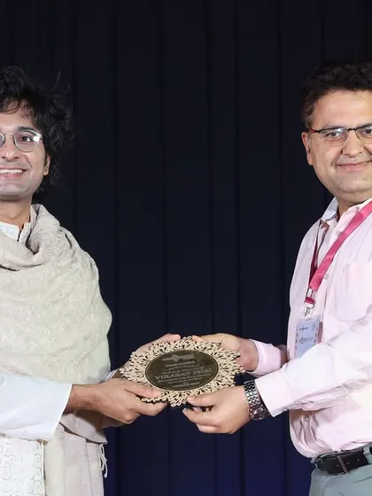 Receiving a memento after our concert at SVNIT Surat. I am always grateful for the love and appreciation from organizers and audiences.
