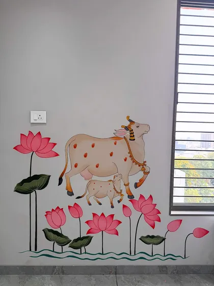 Creating spiritual art for a pooja ghar is a process of devotion for me. This mural features the sacred Kamdhenu cow and her calf surrounded by lotuses, painted in a traditional style to bring blessings and tranquility to the home.