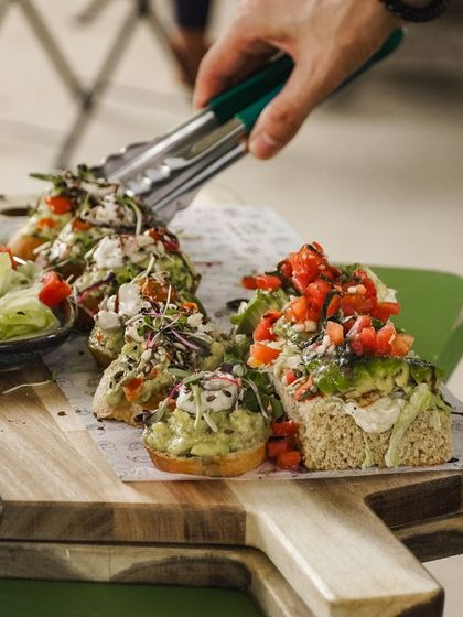 A beautiful brunch setup featuring our popular avocado sandwiches. They are a perfect example of how healthy food can be absolutely scrumptious and visually appealing.