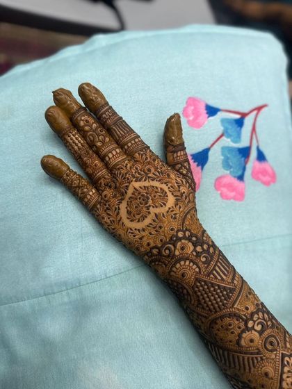 A close-up of the heart motif, showcasing the detailed work inside and around it.