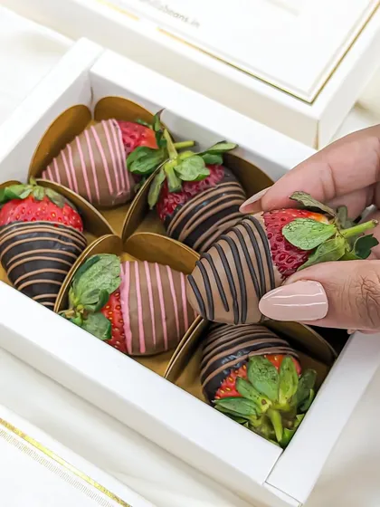 Each strawberry is carefully placed in its own holder within the gift box, ensuring they arrive looking as good as they taste.