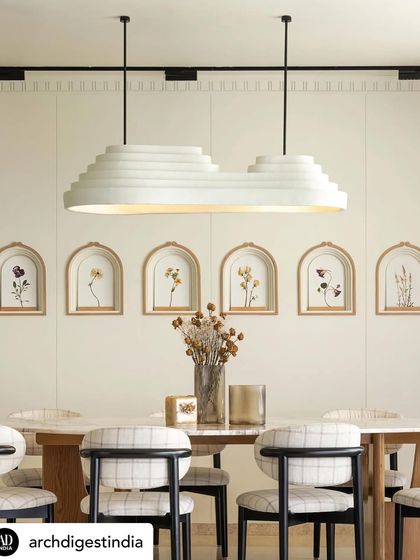 The dining area of KAIA, with its custom light fixture and wall art, was another beautiful shot from our feature in Architectural Digest. It highlights our commitment to bespoke details that tell a story.