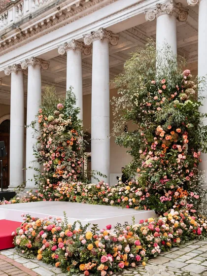 Another view of the stunning mandap at Hampton Court, showing how the floral structures were built around the palace's columns.