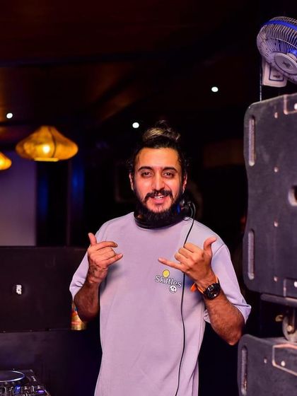 A duplicate of image 53, sharing the chill and positive energy from behind the decks.