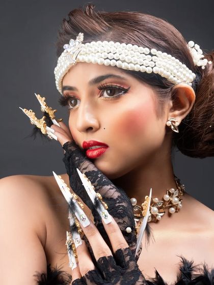 This photo captures the elegant and captivating vibe of the retro fantasy nail art, perfect for a high-fashion photoshoot.