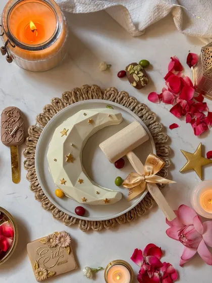 A beautifully styled flat lay of the Eid piñata set, showcasing all the elements together before the fun begins. It's a perfect gift for sharing during festive gatherings.