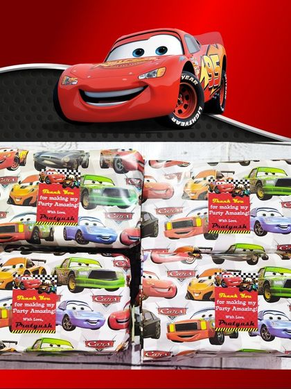 The Cars stationery sets were wrapped in themed paper with a personalized thank you sticker for the party guests.