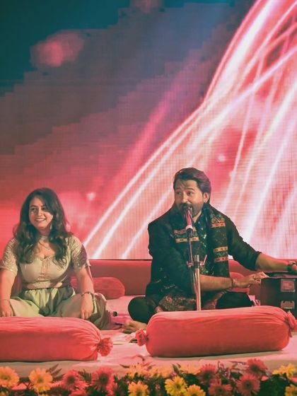 Another angle from a live musical performance, using the dynamic stage lighting to create a dramatic effect. I am experienced in shooting in challenging, low-light concert environments.