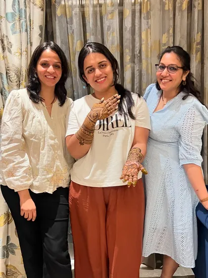 With the wonderful Devisha and my partner Pinky. It was our third time doing mehndi for their family, and it always feels like catching up with old friends.