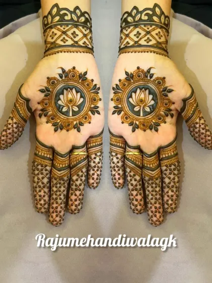 A modern and elegant design with a lotus mandala in the center of the palm. The fingers are decorated with a simple net pattern.