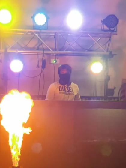 Bringing the heat, literally. Adding some fire effects to the DJ setup to give the party that extra wow factor. It's all about creating memorable moments.