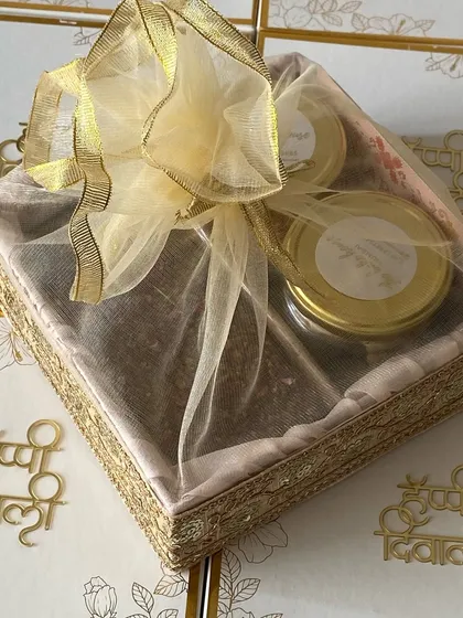 A close-up of the delicate net and ribbon wrapping I use for my smaller Diwali gift baskets.