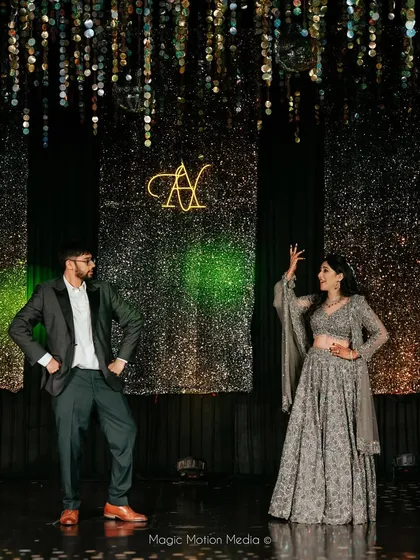 A stylish pose from the couple's sangeet performance. We work with you to find the perfect blend of dance and drama for your big night.