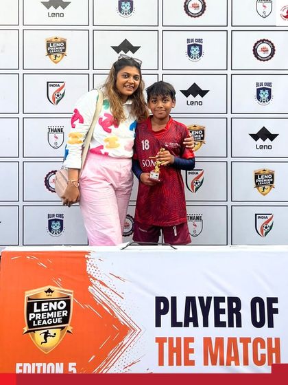 Parshwa Gada of the U-12 Development Team receives his Player of the Match award.
