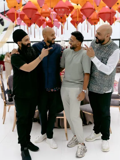 The crew in Tuscany, pointing to the man of the hour. We're more than just vendors, we're a team that has fun and brings great energy to every event.