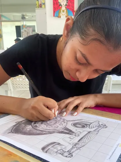 This student is working on a detailed sketch of a vintage telephone, a great exercise for practicing line work and perspective.