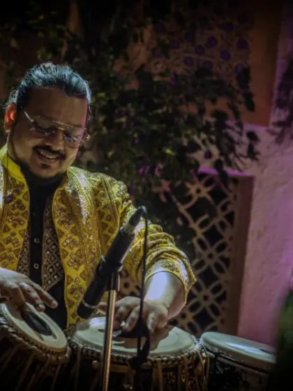 A beautifully lit shot of our percussionist at the ITC Royal Bengal, a venue known for its grandeur.