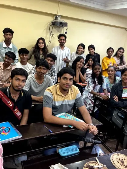 A student takes a selfie with her entire class and teachers in the background during the Teacher's Day festivities.