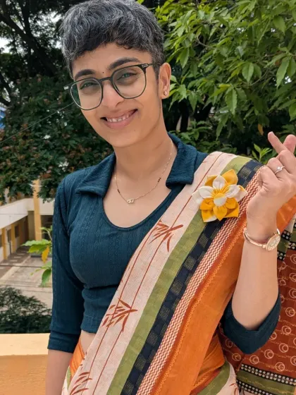 My work is about building community, both online and off. Here I am at our 'Poha-Jalebi Club', a monthly meetup I host. It's a space to connect over shared stories and nostalgia, proving that finding your people can be as simple as sharing a plate of poha.