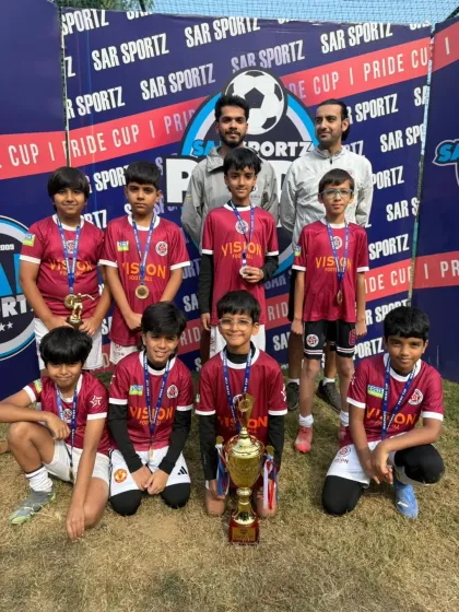A formal team photo with the Pride Cup trophy and medals. Every tournament is a chance to test our skills and prove our mettle against tough competition.
