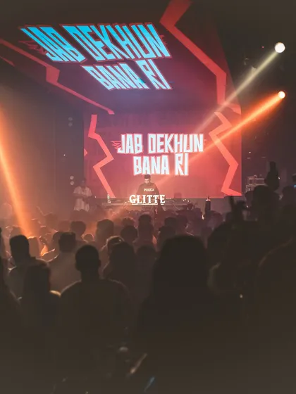 My sets often feature custom Bollywood mashups with visuals to match. Here, the entire club is singing along to a classic, remixed for a modern dance floor.