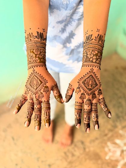 A full view of the front of the hands for Asha's engagement mehendi.