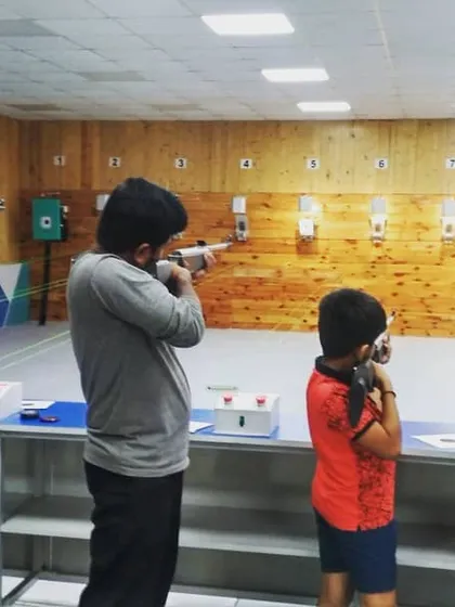 A diverse group of shooters, including a very young camper, learning to handle rifles. My camps are open to anyone aged 9 and above, regardless of prior experience.