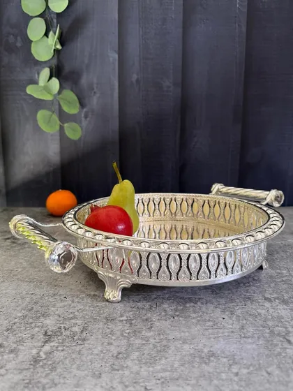 Another view of the round mirrored tray, showcasing its elegant feet and sturdy handles. A versatile piece for any host who values both style and function.