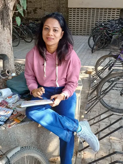 Taking a break during a sketching session at IIT Delhi. Being part of a community like Urban Sketchers is a huge part of my artistic life.