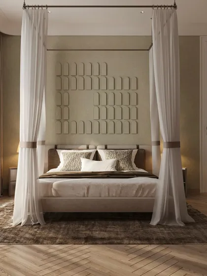 This guest bedroom is wrapped in a soft sage green palette that feels both fresh and timeless. A graceful four-poster bed, draped in airy curtains, anchors the space.