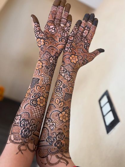 A clear shot of the full floral design, held up to showcase the symmetry and detail.