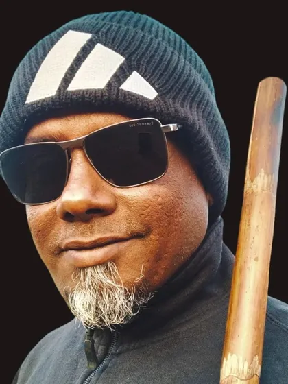 A portrait with a Bo Staff. This simple wooden staff is a versatile and effective weapon, and one of the first we introduce in our weapons program.