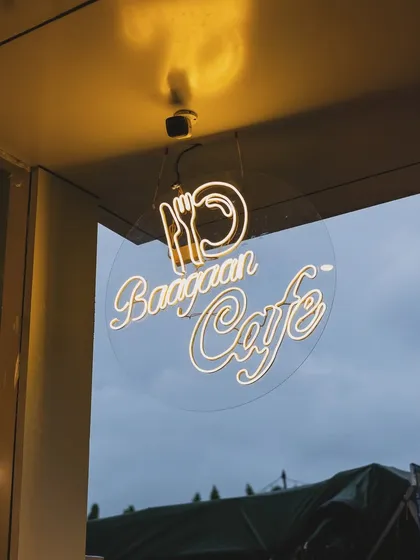 A close-up of our neon sign. The simple, elegant design reflects our approach: good food and a great atmosphere.