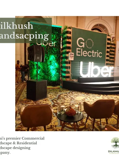 A view of the stage setup for the Uber "Go Electric" event. We designed and installed the green wall panels that frame the stage, bringing a natural element to the corporate presentation.